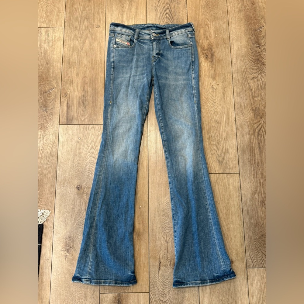 Diesel jeans size 27 mid rise new medium wash